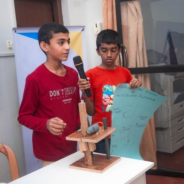 kids smiling with their instructor