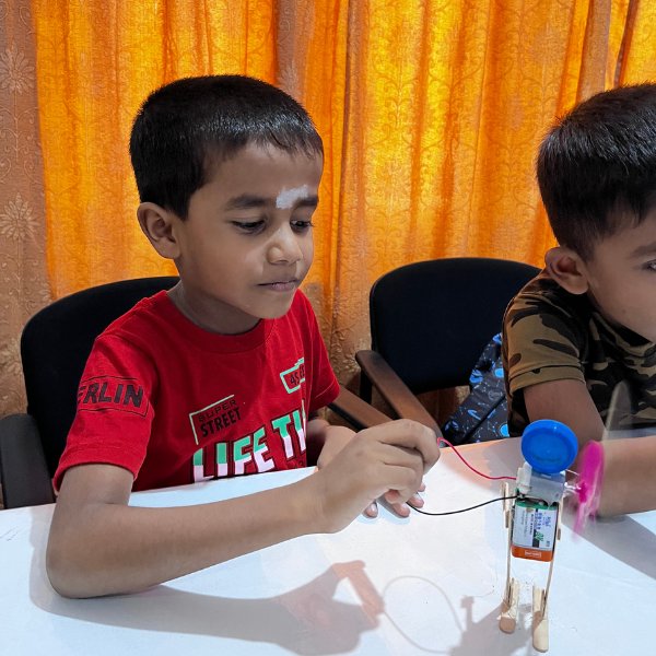 kids smiling with their instructor