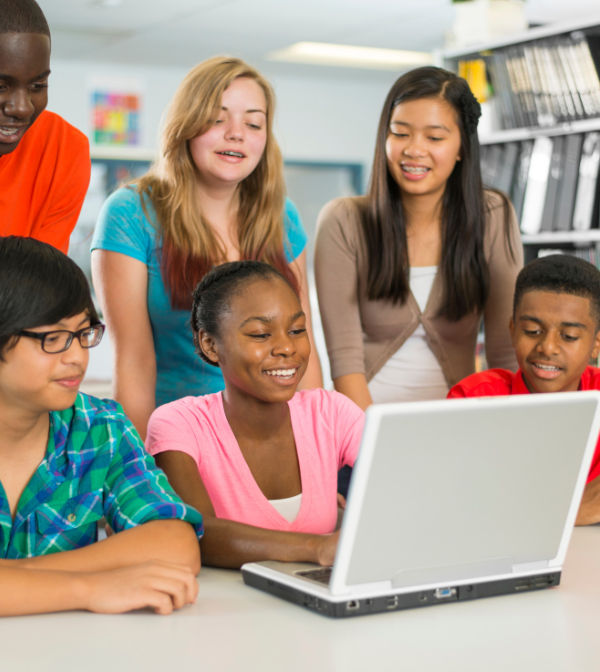 Kids coding on laptop